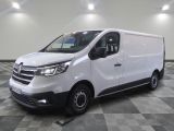the white van is parked on a checkered tile floor