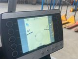 a close up of a machine with a screen on the side of it