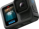 an image of a gopro action camera is shown with the screen open