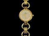 an image of a close up of a wrist watch on a black background