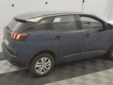 a picture of a blue car parked in a garage