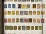 an open book with a bunch of different stamps on it