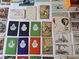 many cards on a table with a box of them