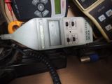 a close up of a cell phone and other electronic equipment
