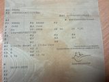 a picture of a receipt with a picture of a person on it