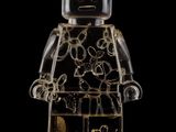 a lego man that is standing up with a black background
