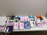 a lot of books on a table that are on the table
