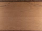 a picture of a piece of wood that is on a table