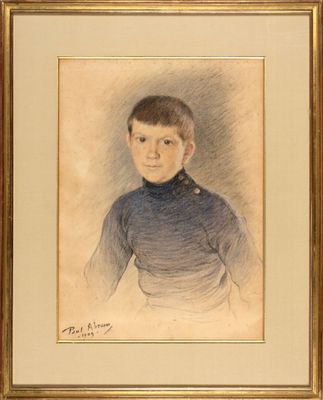 portrait of a young boy in a blue shirt