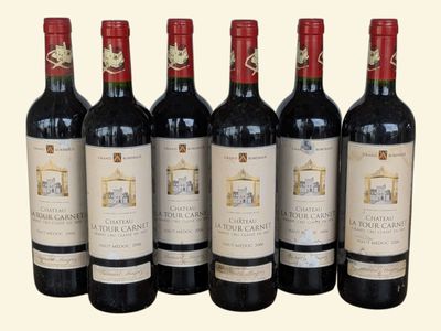 six bottles of red wine are lined up in a row