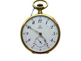 un gros plan d'une montre de poche en or avec un cadran blanc