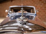 a close up of a car with a hood ornament on it