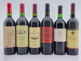 six bouteilles de vin sont alignées sur une table