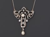 un pendentif Art déco en perles et diamants, monté sur une chaîne