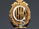 a close up of a badge on a black surface