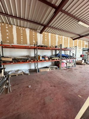 a large room with a lot of shelves in it
