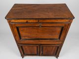 a small wooden cabinet with two drawers and a drawer underneath it