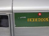 un gros plan sur un wagon vert et blanc