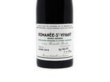a bottle of wine that is sitting on a table