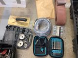 a lot of tools that are sitting on the floor