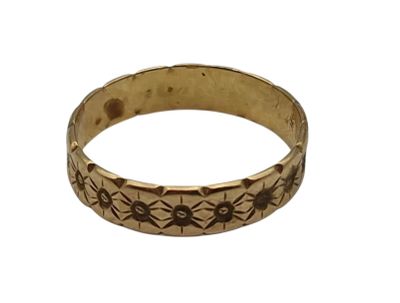 une image représentant une bague en or ornée d'une araignée
