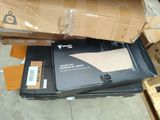a pile of boxes that are sitting on the floor