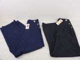 two pairs of navy blue pants with gold buttons on them
