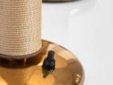 two spools of yarn on top of a gold plate