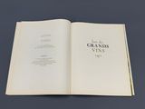 an open book with a picture of grands wines on it