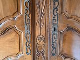 a large wooden door with a decorative design on it