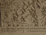 a map of the french alps on the wall