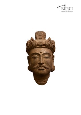an image of a statue of a man with a crown on his head