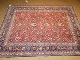 an oriental rug on the floor in a room