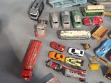 a lot of toy cars that are sitting on a table