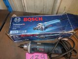 a box of bosch tools on a table next to a corded cord