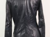 the back of a black leather jacket on a mannequin mannequin mannequin mannequin mannequin mannequin mannequin manne