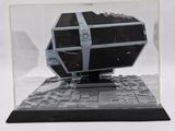 a model of a star wars tier in a display case