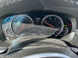 a close up of a car dashboard with a speedometer and gauges