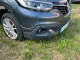 a car that is parked on the grass in the yard