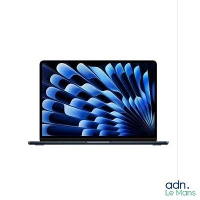 an image of a laptop computer with a blue flower on the screen