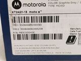 the back of a motorola phone box with a bar code on it