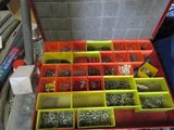 a red case filled with lots of assorted items