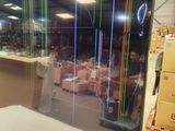 an image of a large television screen in a warehouse