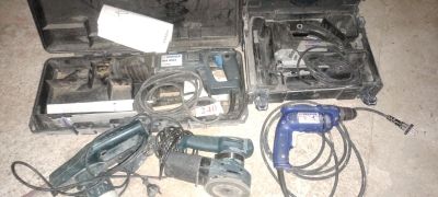 a lot of tools that are laying out on the floor