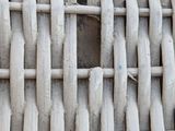 an image of a close up view of a woven chair