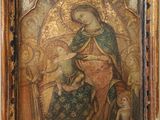 tableau représentant la Vierge Marie et l'Enfant Jésus dans un cadre doré