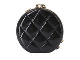 the small black purse has a quilted design on the front of it