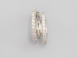 a pair of diamond hoop earrings