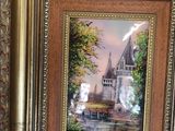 framed picture of a painting of a church with a train coming down the tracks
