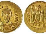 une pièce d'or portant l'image d'un homme et d'une femme